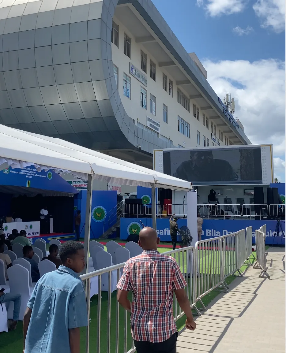 DCEA display truck screening the road safety film alongside the branded tent
