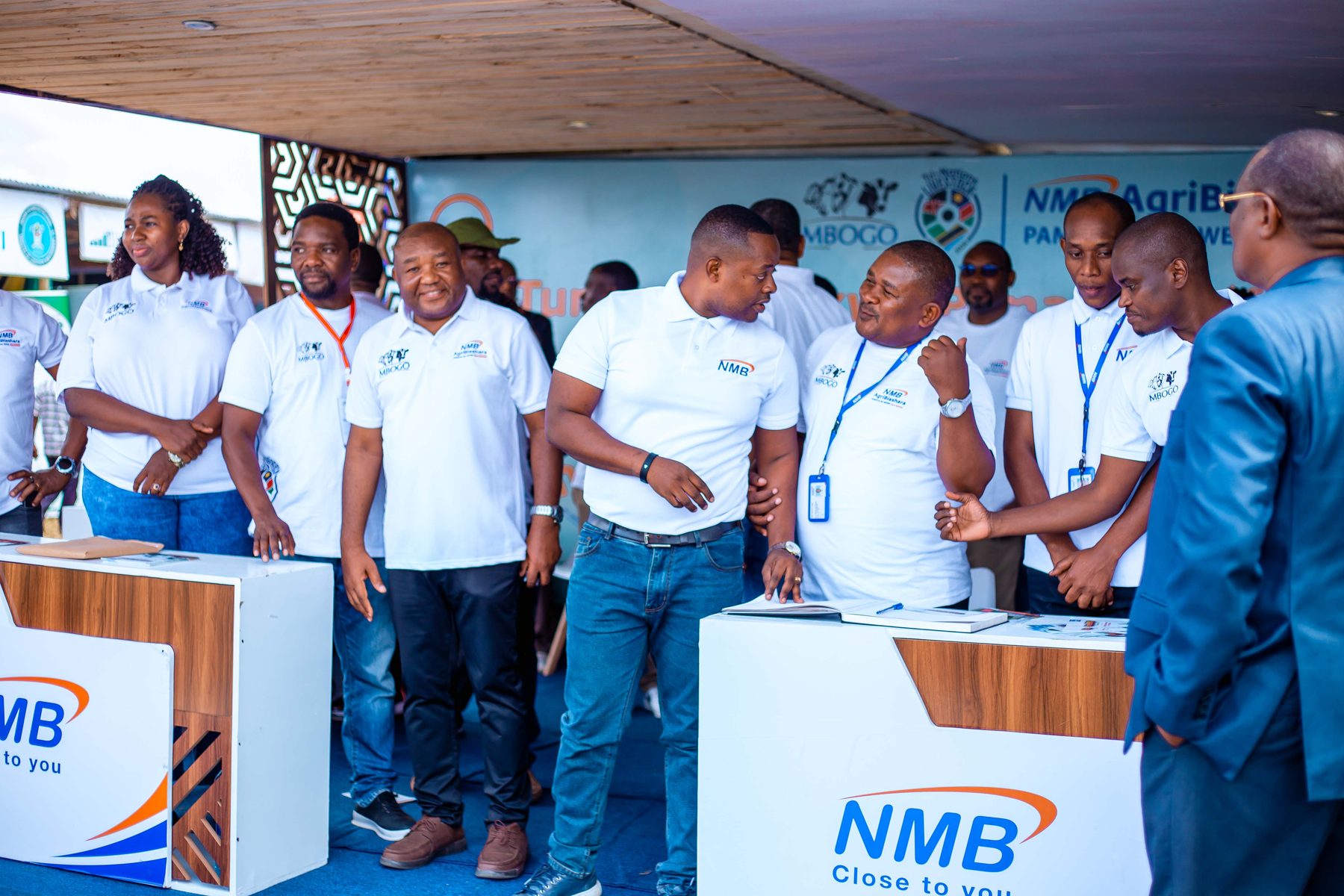 NMB team and officials at the AgriBiashara booth, Ubena Zomozi exhibition
