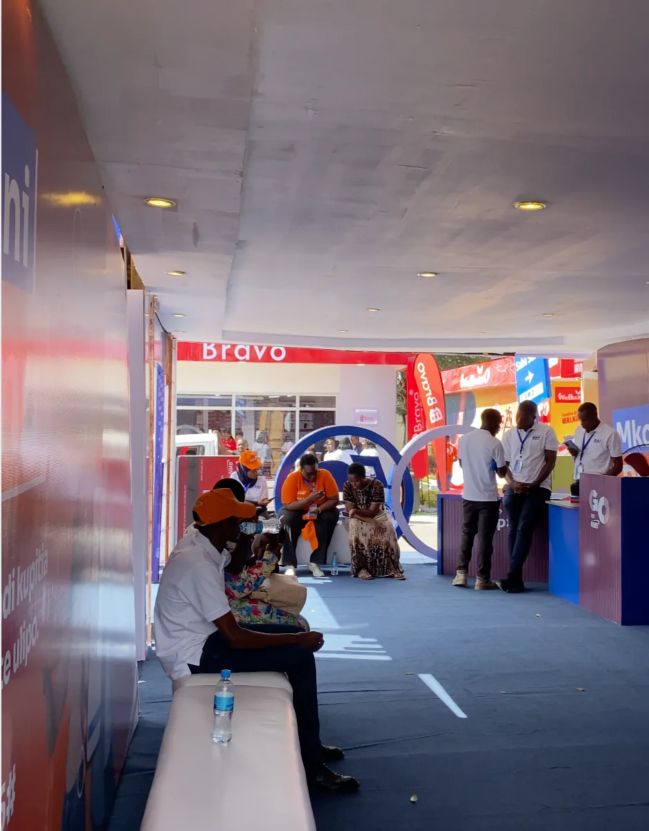 Finished interior of the NMB pavilion with visitors seated at the Saba Saba trade fair