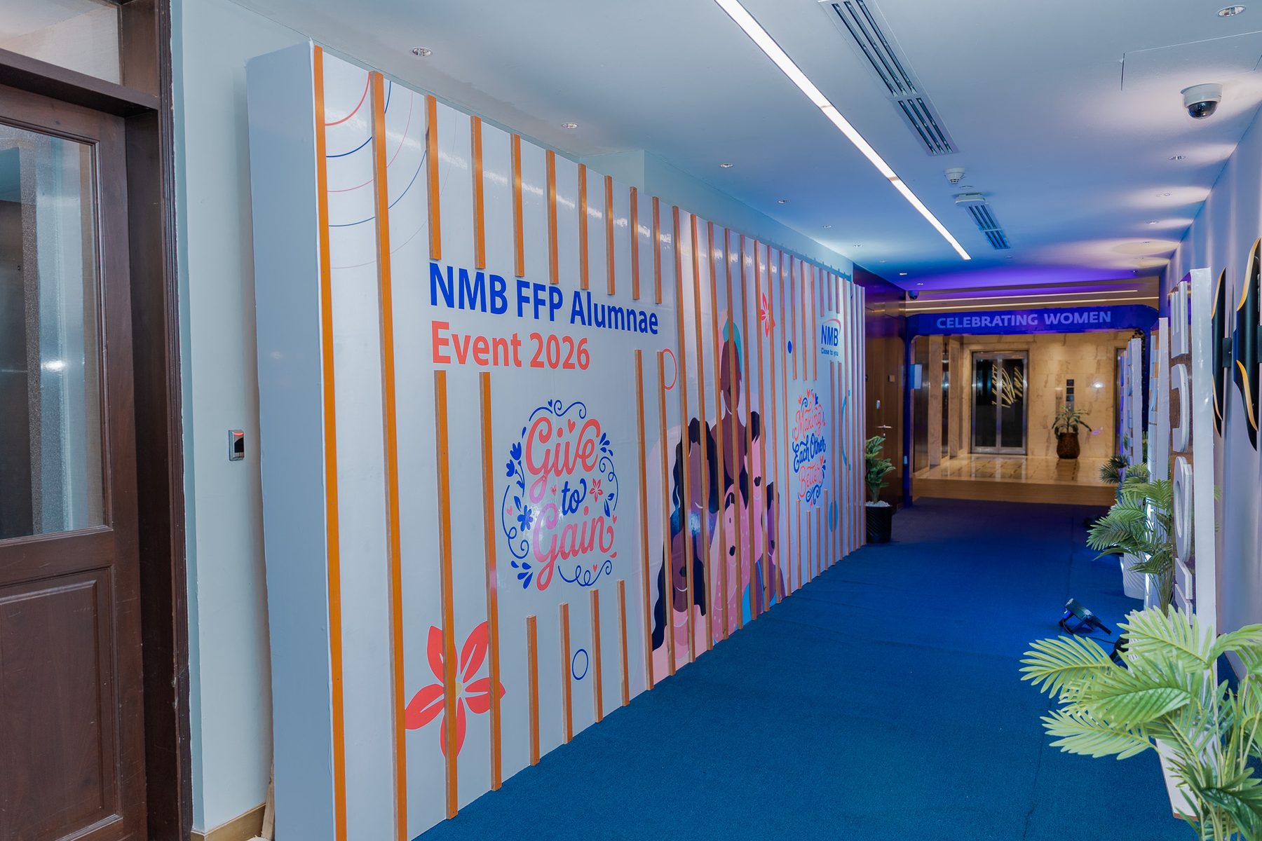 Branded corridor leading to the Celebrating Women entrance, NMB FFP Alumnae Event 2026