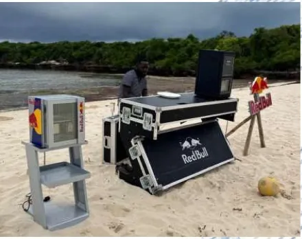 Red Bull branded equipment and cooler setup for a beachfront activation