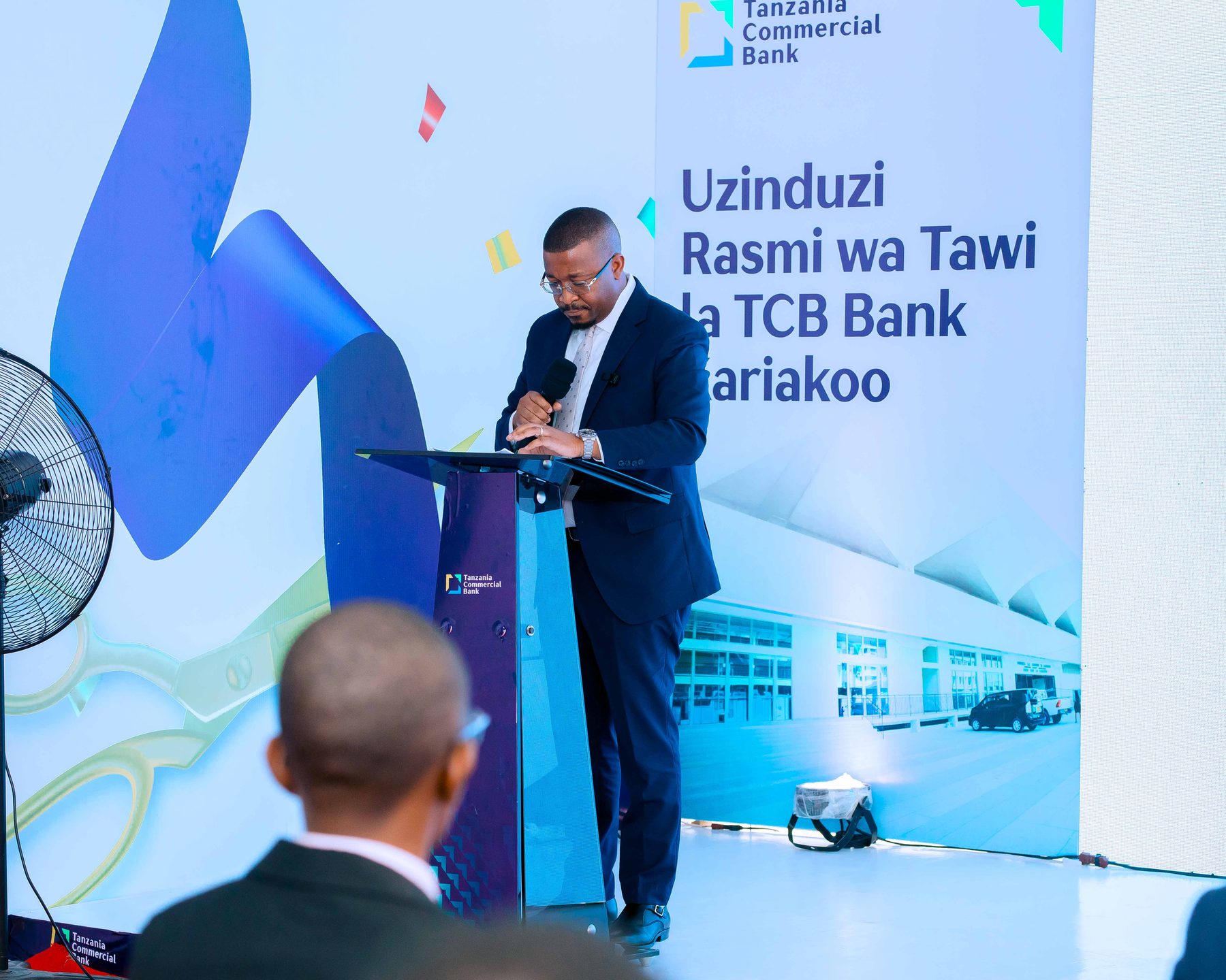 Official remarks on stage at the TCB Kariakoo branch launch