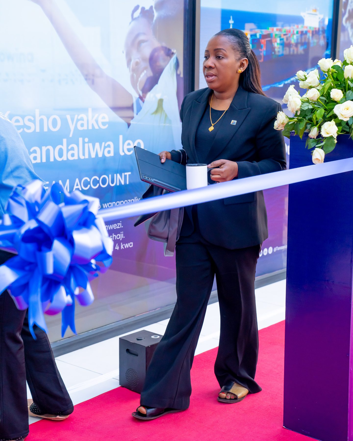 Ribbon-cutting moment at the entrance of TCB's new Ubungo branch