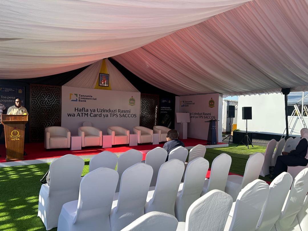 MC addressing guests from the podium at the TCB TPS SACCOS ATM card launch